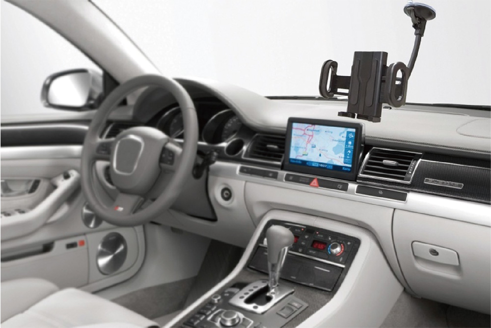 Image of a car holder plugged onto the dashboard window, showcasing its secure attachment and convenient design for in-car use